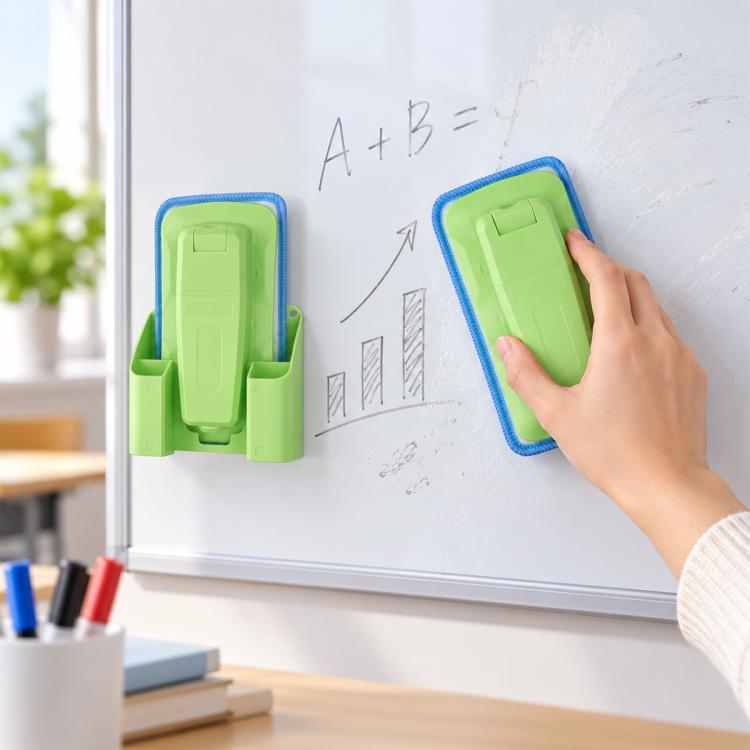 Green magnetic spray board eraser with detachable washable pad, held to wipe board marks