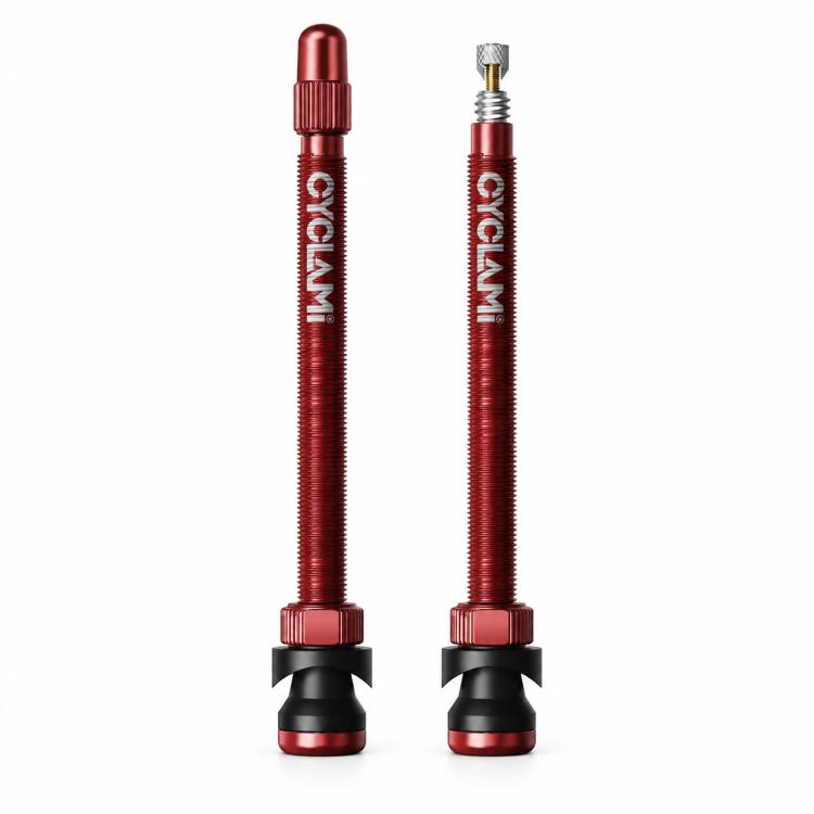 Pair of red Presta tubeless valve extenders with extended aluminum stems and rubber bases