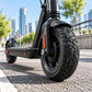 Front replacement wheel: 11-inch black tubeless scooter tire with deep tread