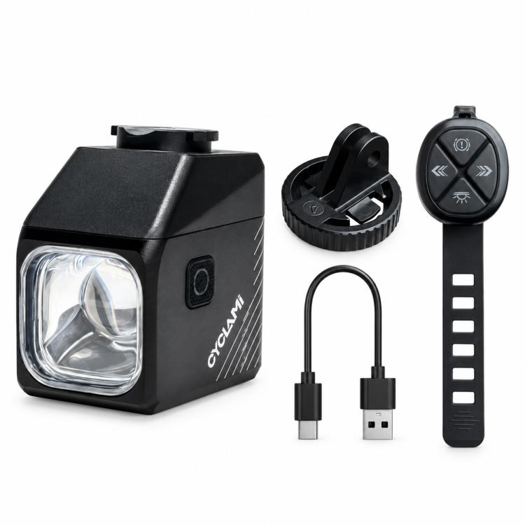 Cycling front light kit with remote, mounting clip, USB charging cable, and cover mount