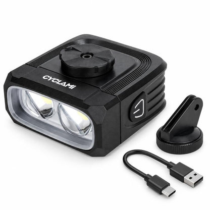 Front bike headlight with cutoff beam lens, mount bracket, and USB charging cable