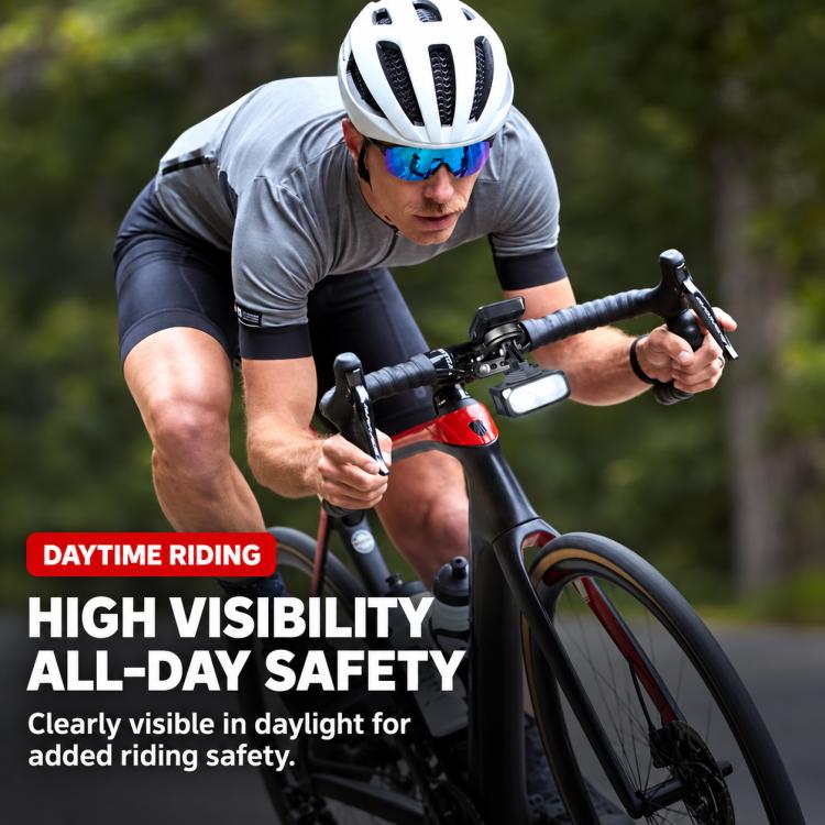 Handlebar bike front headlight in use during daytime riding