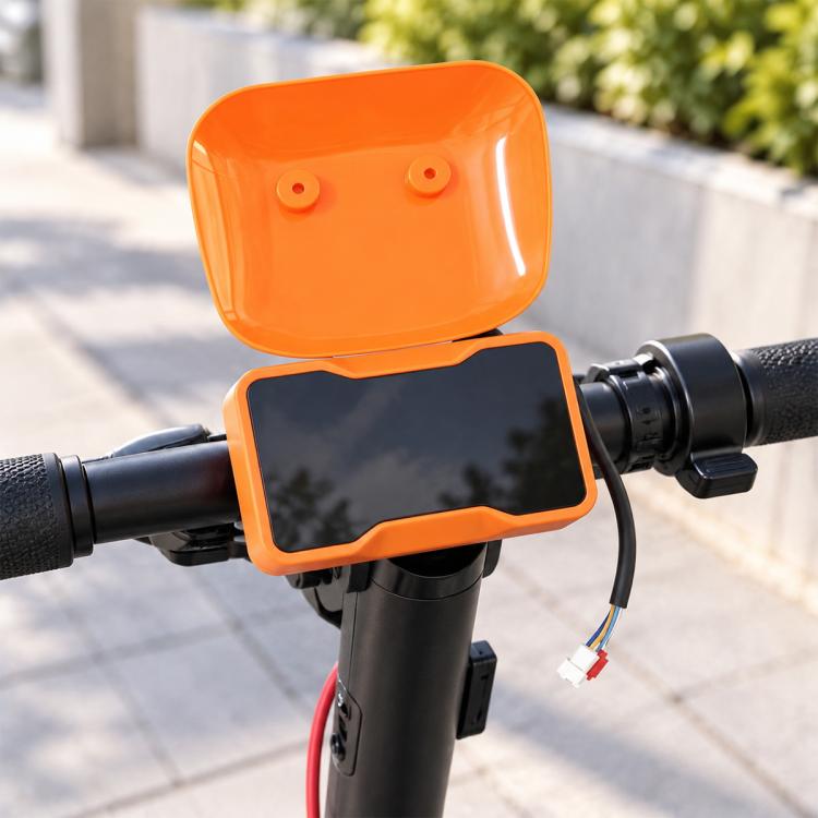 Electric scooter dashboard display with orange protective cover and black screen