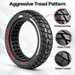 Solid scooter tire with aggressive tread blocks and red side stripe, enhanced grip detail