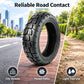 Electric scooter tire with chunky tread, black rubber and teal lines on pavement