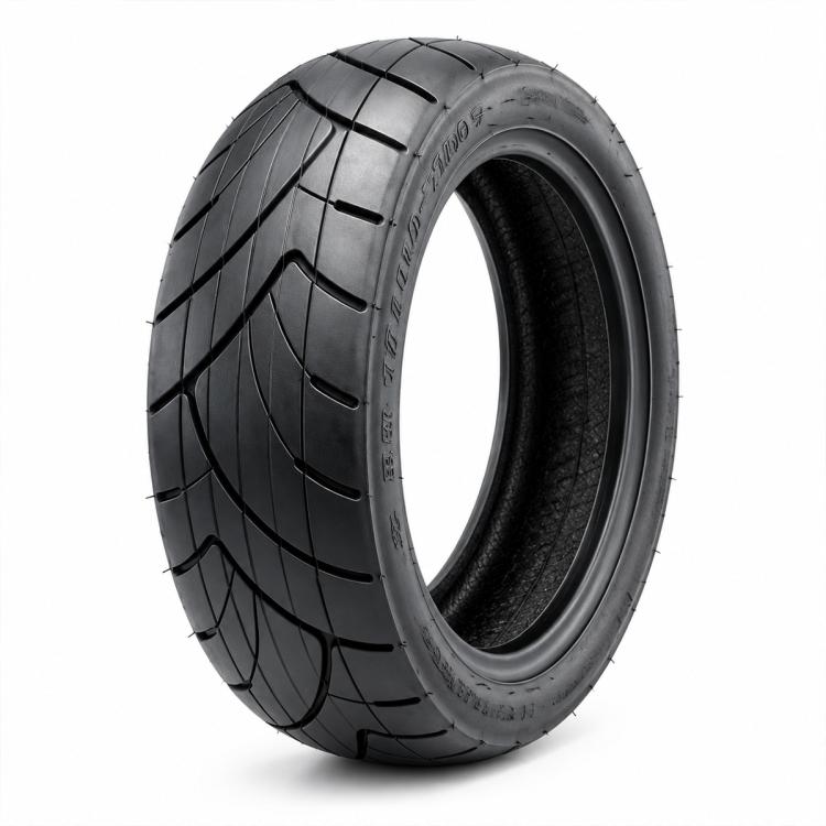Black scooter tire with deep tread and visible inner rim surface