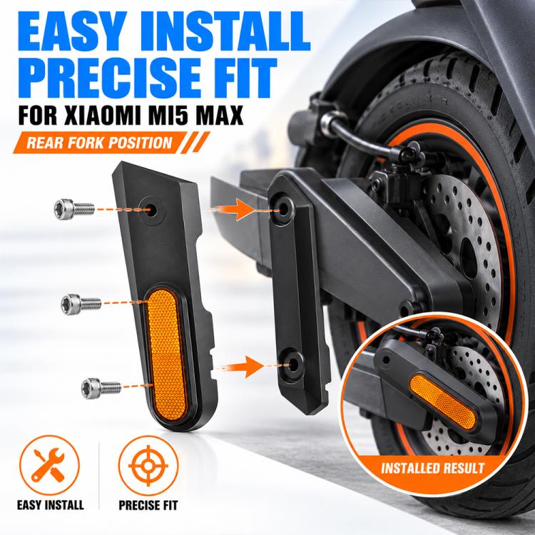 Side cover pair with amber reflective insert, shown near front wheel mounting