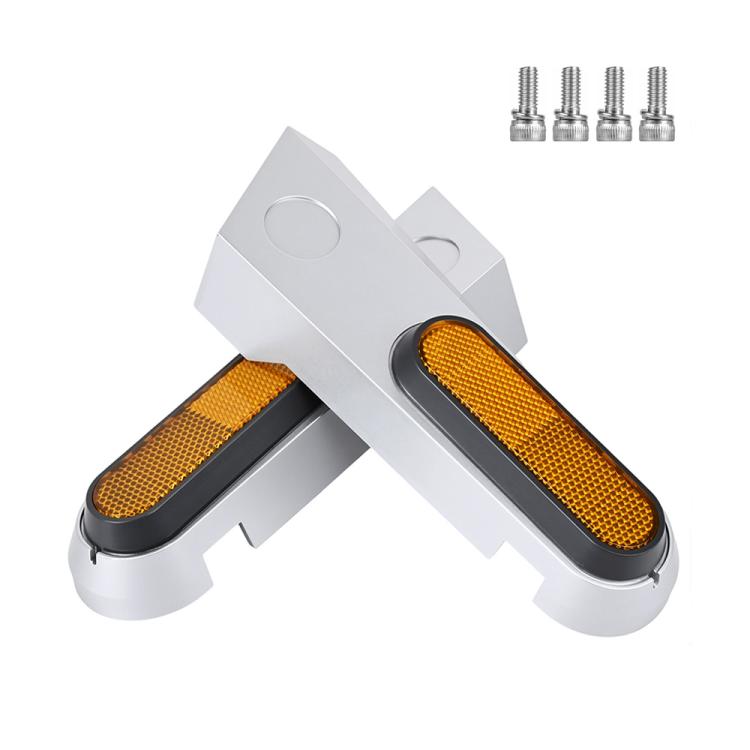 Pair of white decorative side covers with amber reflector lenses and black trim
