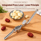 Lever-style garlic press with perforated plate for mincing, placed on wooden board
