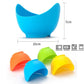 Blue silicone egg poacher cup with size markings, plus multicolor cup set