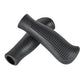 Set of two black textured silicone handlebar grip covers with tapered ends.