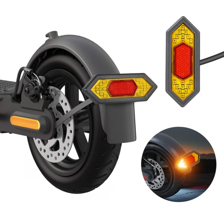 Electric scooter rear turn signal light with red lens and yellow circuit-style frame