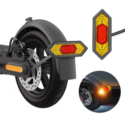 Electric scooter rear turn signal light with red lens and yellow circuit-style frame