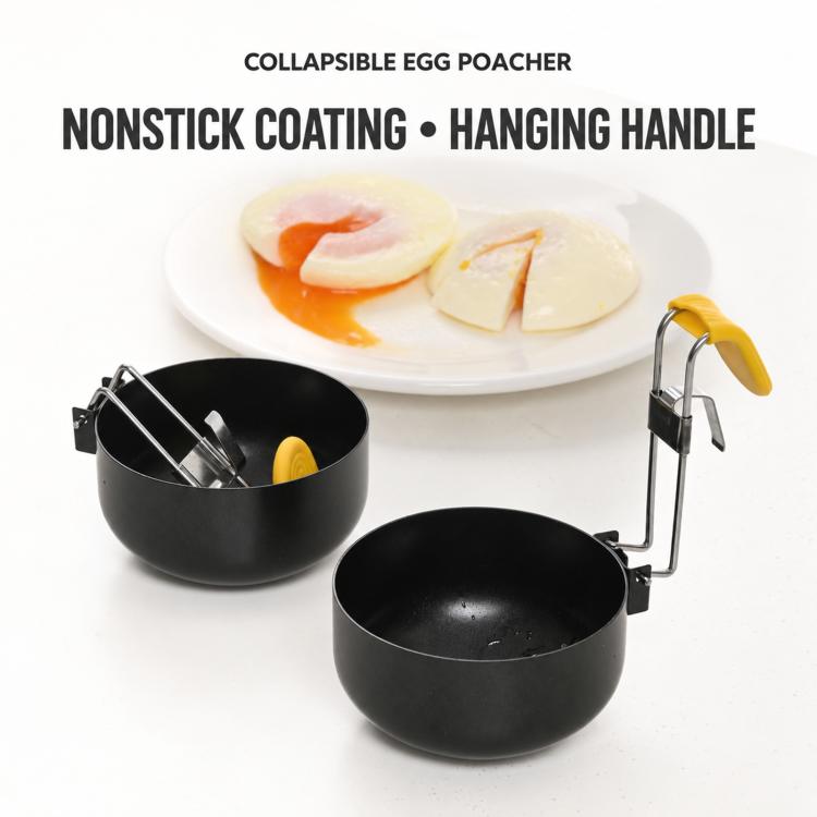 Two black nonstick folding egg poachers with yellow silicone grip hanging handles