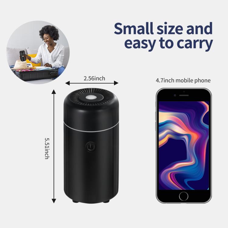 Black cylindrical car air freshener humidifier with circular top mist opening