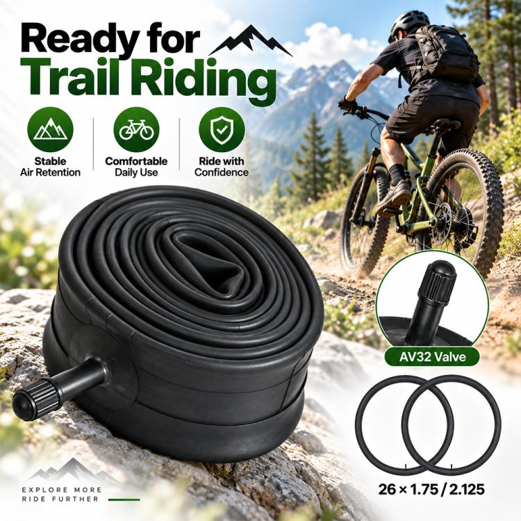 Black bicycle inner tube coil with AV32 valve stem, shown near a wheel