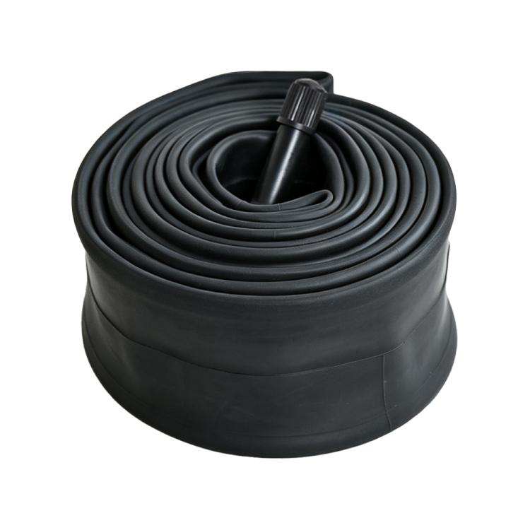 Black bicycle inner tube coiled with valve stem