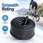 Black coiled bicycle inner tube with valve stem.