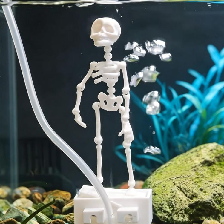 White dancing skeleton aquarium air ornament with clear tube and suction-cup base.