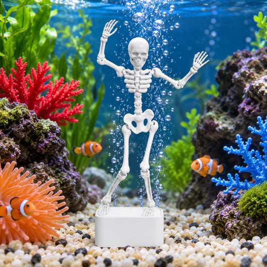 White skeleton aquarium air stone ornament releasing bubble streams from a square base.