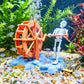 Orange waterwheel skull aquarium bubbler ornament with clear air hose and base.