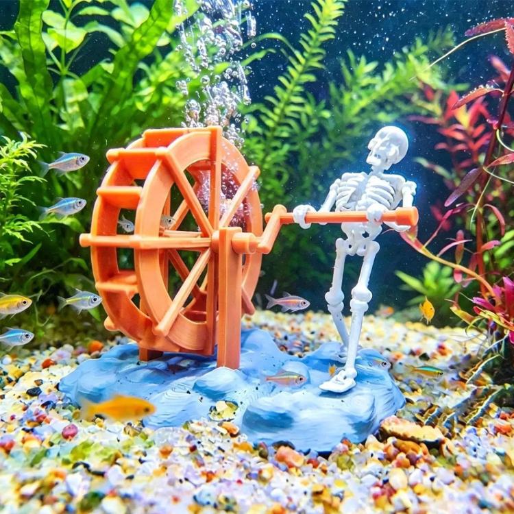Orange waterwheel skull aquarium bubbler ornament with clear air hose and base.