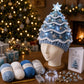 Lighted Christmas tree crochet hat with blue knit and glowing star topper