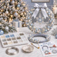 Blue pearl Christmas wreath with light blue satin bow, hanging tree and house ornaments