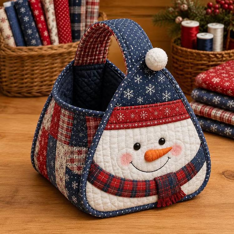 Quilted Christmas carry basket with snowman face applique, blue red patterned panels
