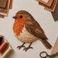 3D patchwork sparrow bird applique, orange and brown layered feathers on fabric