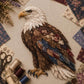 Layered patchwork eagle craft bird with dark wings and blue accents