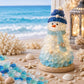 LED sea glass snowman figurine wearing blue cap on wooden base with warm lights