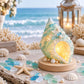 LED sea glass conch shell figurine with glowing center on wooden base
