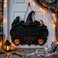 Hanging Halloween welcome door plaque with witch hat, crescent moon, ravens, and orange pumpkins