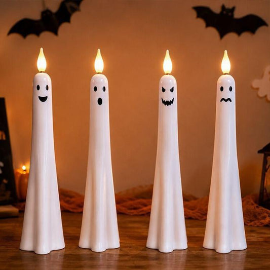 Ghost-shaped LED flameless candles, white plastic with black smiling faces (set of 4).