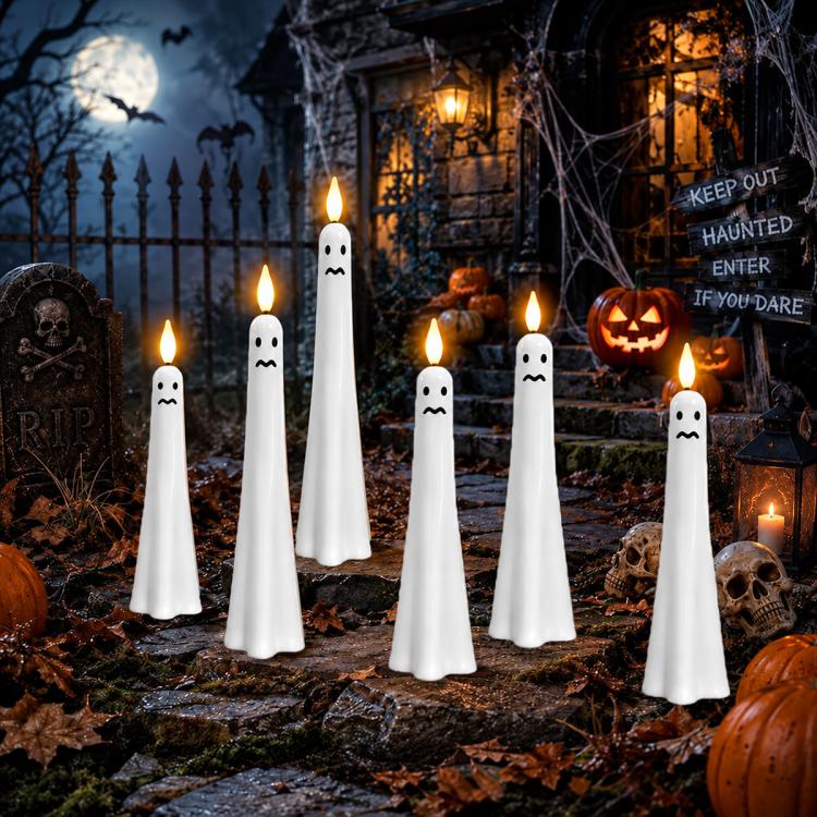 Ghost-shaped LED flameless candles, white plastic with mischievous black mouth lines (set).