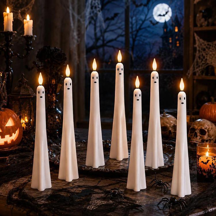 Halloween ghost-shaped LED flameless candles with glowing tips and black face dots