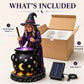 Solar witch cauldron stake light set with witch figure, glowing cauldron, solar panel, and box