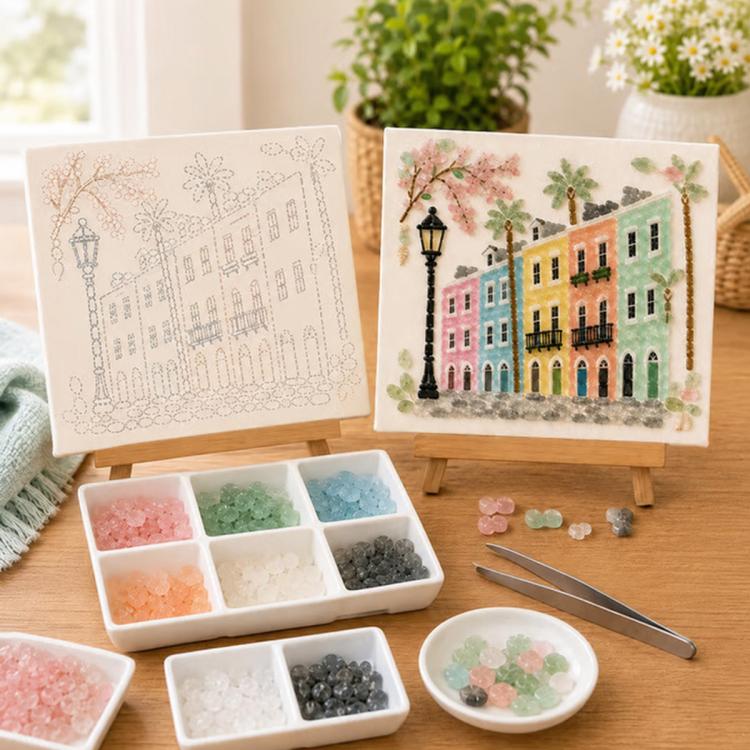 Sea glass art kit supplies: blank template, completed card, and colored glass in trays