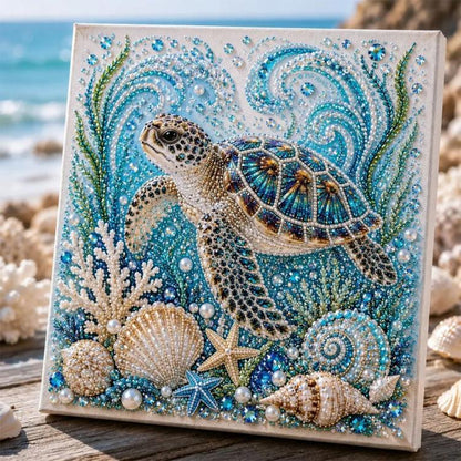 Sea turtle pearl art canvas with blue, green, and rhinestone-like accents on a framed panel