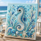 Seahorse pearl art canvas in blue with shell and starfish embellishments on a framed panel