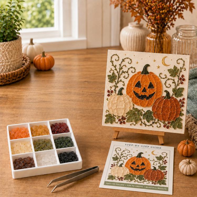 Halloween sea glass DIY art kit with jack-o’-lantern pumpkin artwork on easel