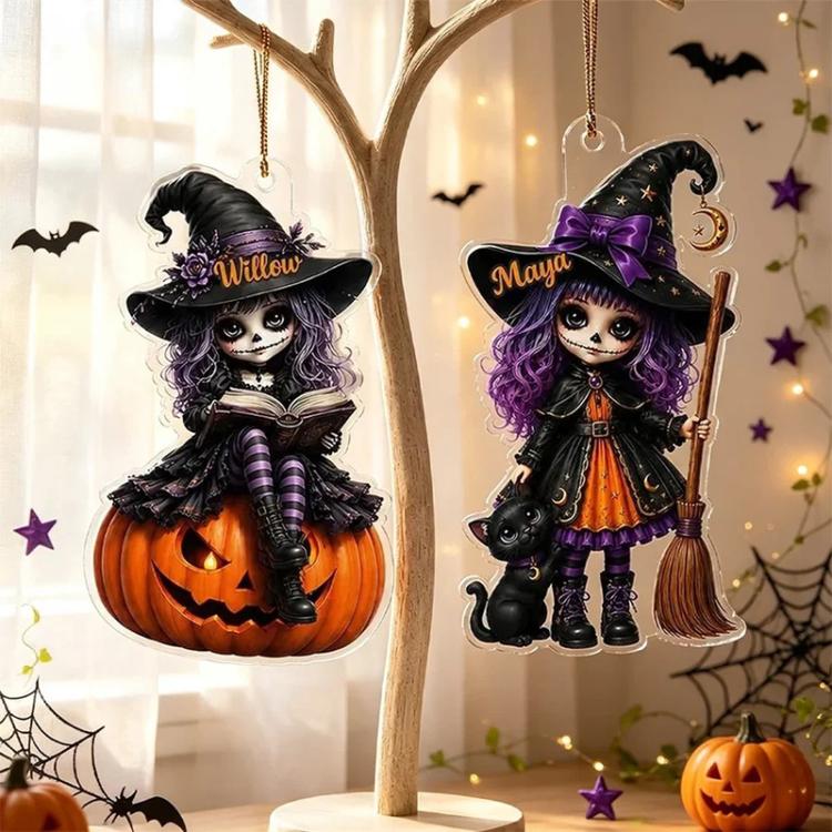 Two Halloween witch acrylic hanging ornaments with jack-o-lanterns, cats, and broom