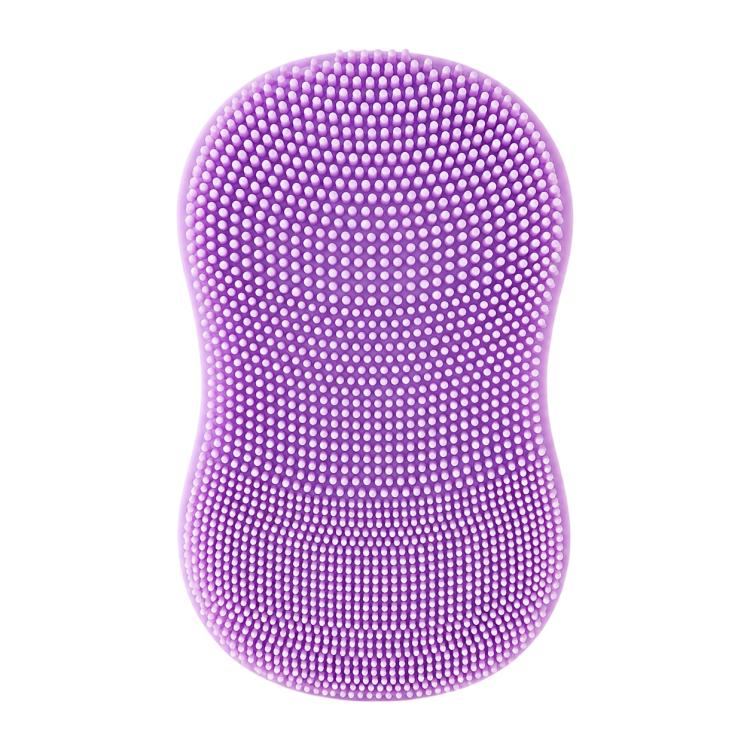Purple silicone face cleansing brush with dense domed bristle tips on oval pad