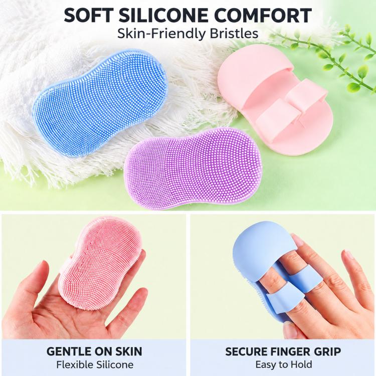 Blue and pink silicone face cleansing brushes with finger-grip back and domed bristles