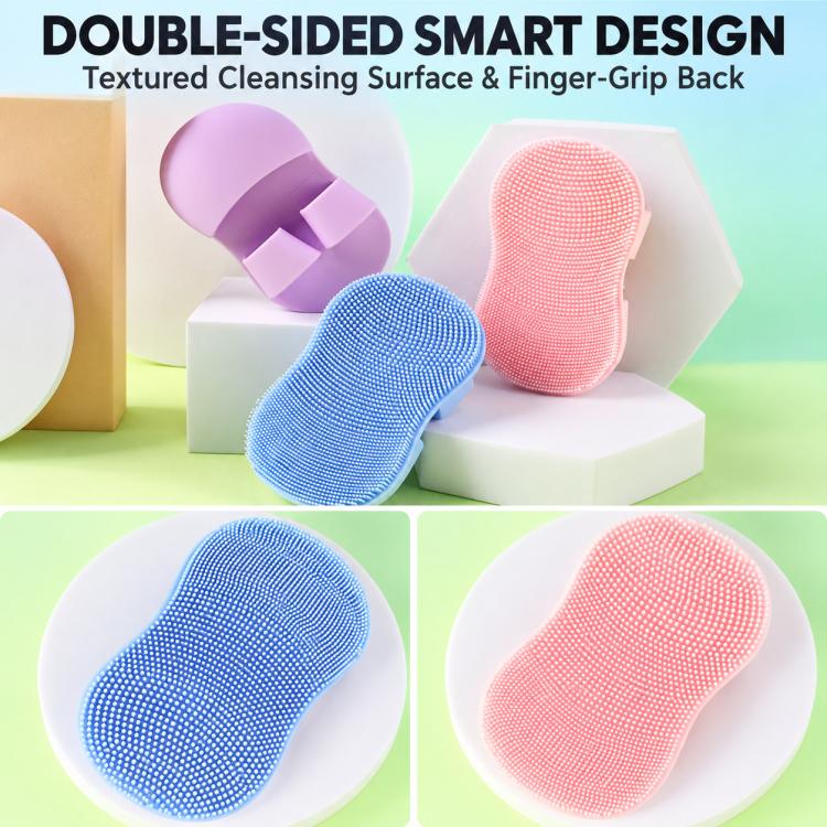 Double-sided silicone face cleansing brushes with textured cleaning surface and finger grips