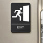 Black Braille sign with raised exit icon, tactile dots, and EXIT label.