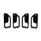 Set of four black door-handle protective frames, glossy cutout design