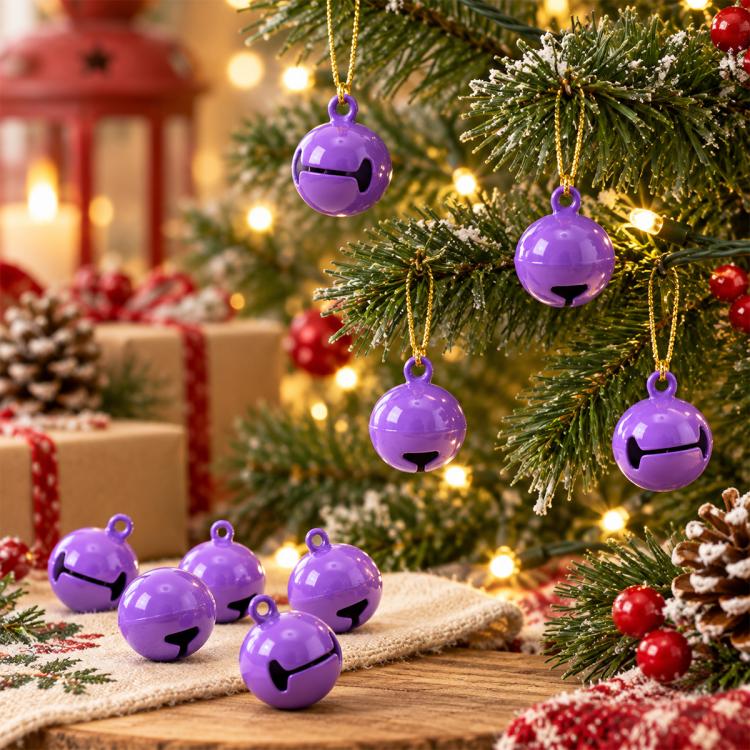 Purple painted small round bell charms, 14mm, hanging on a Christmas tree branch