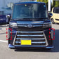 Installed chrome rear bumper fog light trim bezels with rectangular openings